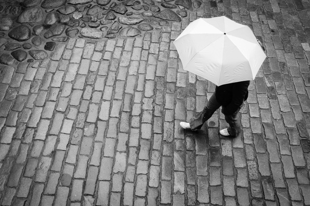 Woman with umbrella in rain - Fotó, kép