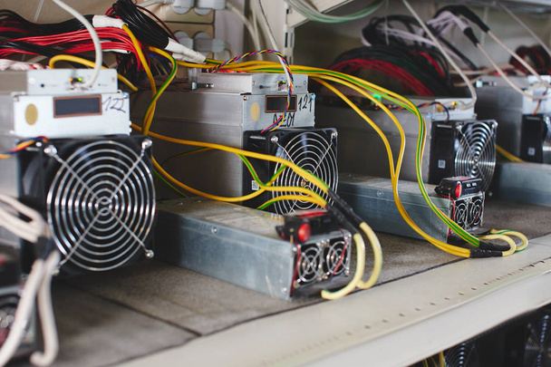 Farm with equipment for bitcoin cryptocurrency mining  - 写真・画像
