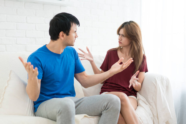 Couple having argument conflict, bad relationships. Angry fury woman screaming man stress in house. - Φωτογραφία, εικόνα