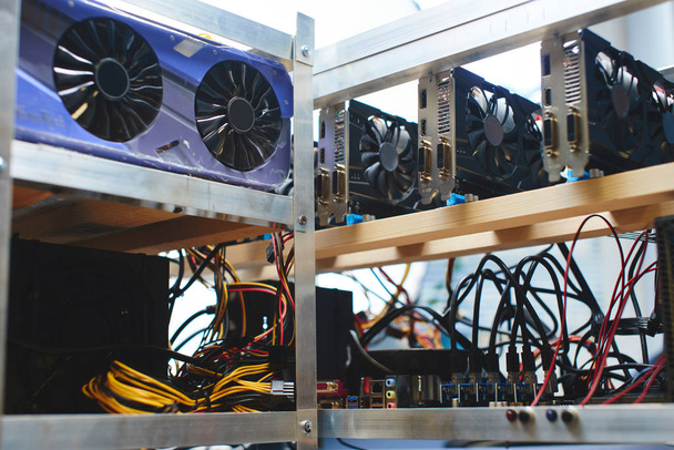 Farm graphics cards for mining crypto currencies on shelves - Photo, Image