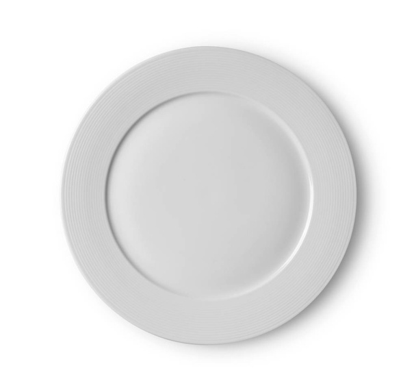 Біла тарілка на білому тлі
 - Фото, зображення