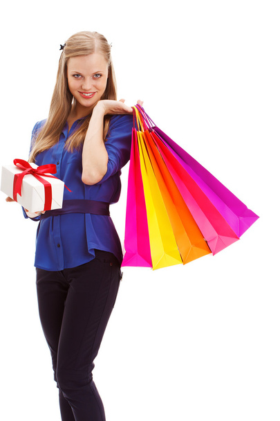 Woman holding shopping bags and white gift box - Fotoğraf, Görsel