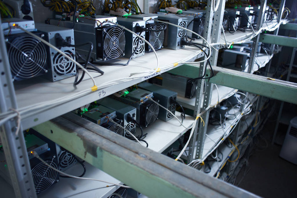 Farm with equipment for bitcoin cryptocurrency mining   - 写真・画像