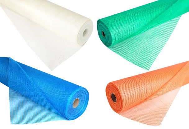 A set of fiberglass netting (reinforcing mesh) rolled up in a roll  for the insulation of walls. Building accesories for reinforcing walls in the process of their warming - Φωτογραφία, εικόνα
