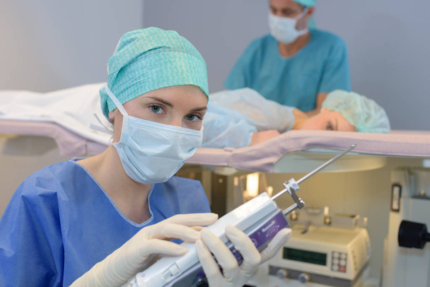 Nurse holding medial equipment - Foto, immagini