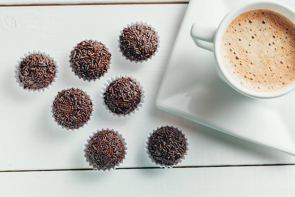 Traditional Brazilian chocolate candy called brigadeiro in coffee gourmet version - Photo, Image
