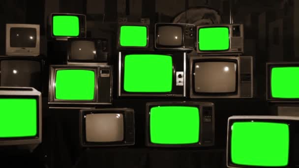 Veel tv's met groene schermen. Sepia toon. Esthetiek van de jaren 80. Klaar om te vervangen groene schermen met om het even welke beelden of afbeelding u wilt. Full Hd. - Video