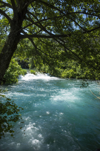 Krka National Park Croatia Europe. Beautiful sunny summer day. Nice outdoors photo of nature and landscape. Lakes, rivers and waterfalls - Photo, Image