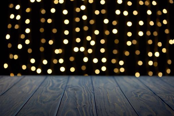 empty wooden surface and beautiful golden bokeh background - Photo, Image