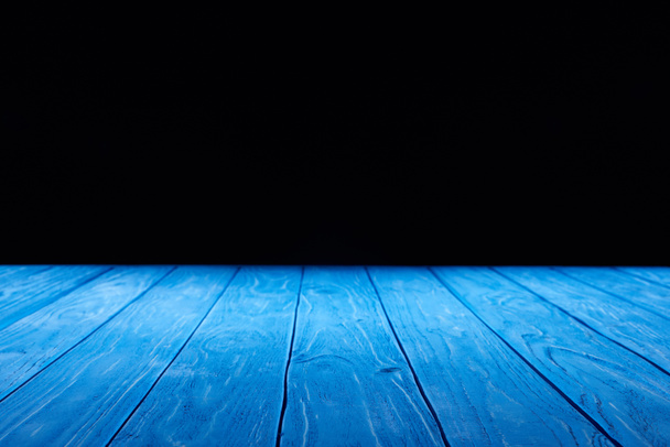 empty light blue wooden planks surface on black background - Photo, Image