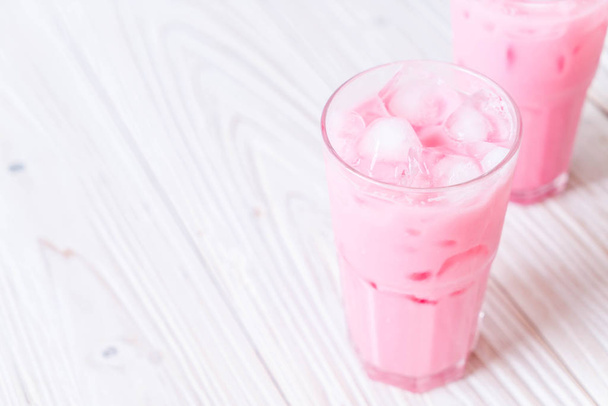 pink strawberry milkshake on wood - Fotografie, Obrázek