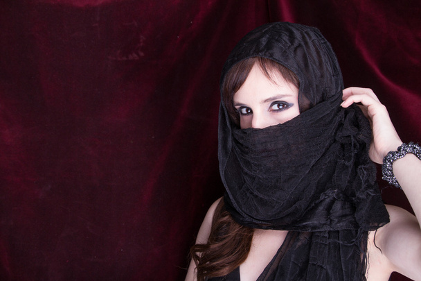Beautiful woman in traditional veil - Фото, изображение