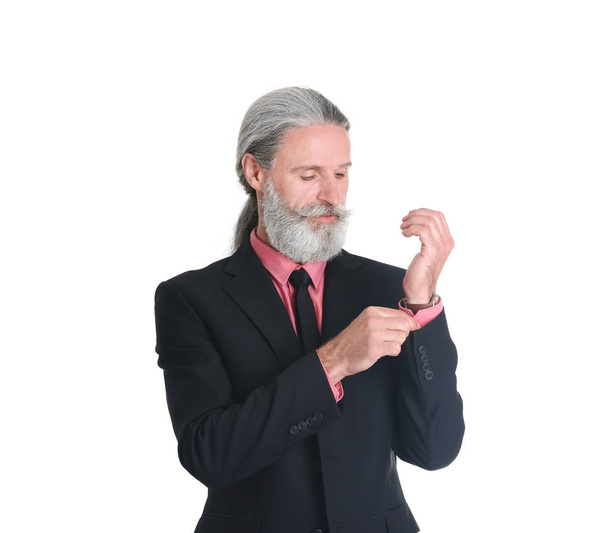 Handsome bearded mature man in suit on white background - Photo, Image
