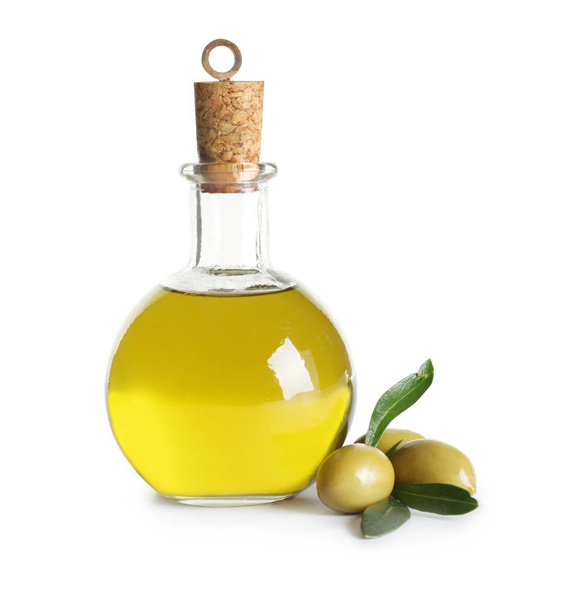 Glass bottle with fresh olive oil on white background - Valokuva, kuva