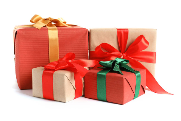 Beautifully wrapped gift boxes on white background - Photo, image