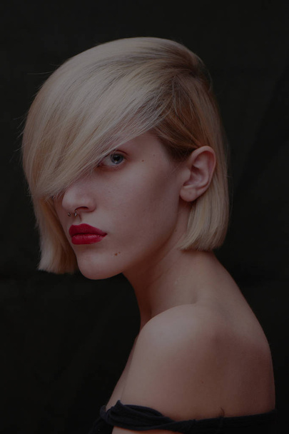 portrait of blonde woman looking at camera  - Fotografie, Obrázek