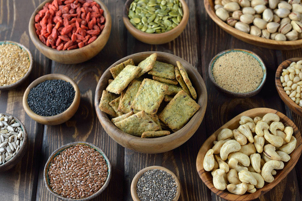 Super foods on a wooden background, healthy eating concept - Foto, imagen