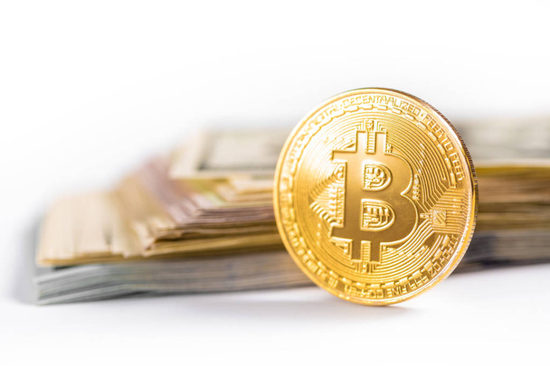 electronic crypto currency, golden bitcoin with dollars on white background - Foto, Imagen