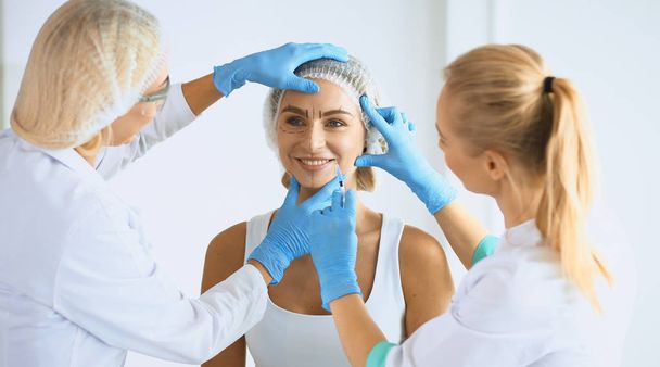 woman getting injection. beauty injections and cosmetology - Valokuva, kuva