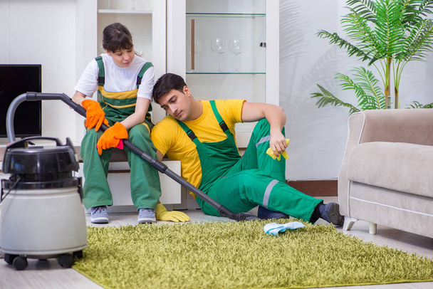 Cleaning professional contractors working at house - Foto, Imagen