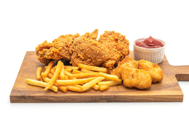 fried chicken with french fries and nuggets meal (junk food and unhealthy food) isolated on white background - 写真・画像