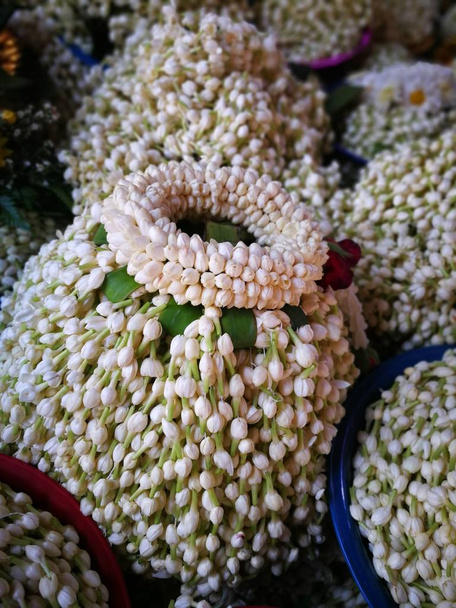 a lot of Jasmine garland flowers for play Buddha statue in Temple at the North of Thailand  at Wat Phra That Doi Kham (Temple of the Golden Mountain) Chiang Mai - Photo, Image
