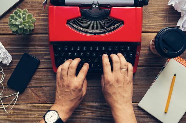 Top view of man using typewriter - Foto, imagen