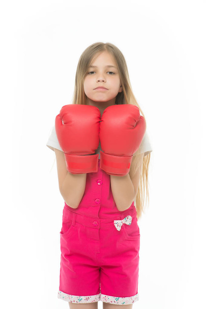 Girl in red boxing gloves isolated on white. Little child smile and boxing. Ready to fight. Adorable boxer. Power and strength. Kid boxer ready to fight. I can defense myself. Punching. Sport workout - Photo, image