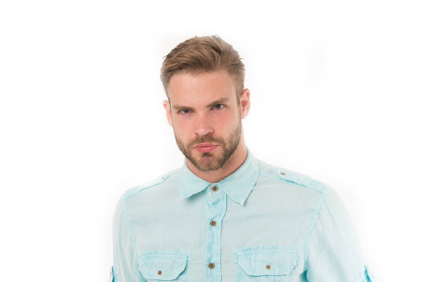 Handsome man in blue shirt, fashion. Man with beard on serious fac isolated on white backgrounde. Bearded and stylish. Hair and barber salon. Skin care and grooming. Casual in style - Фото, изображение