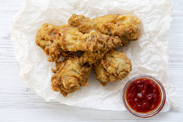 Fried chicken legs with sauce, top view. Close-up. - Valokuva, kuva