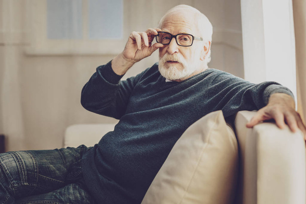Nice aged man fixing his glasses - Zdjęcie, obraz