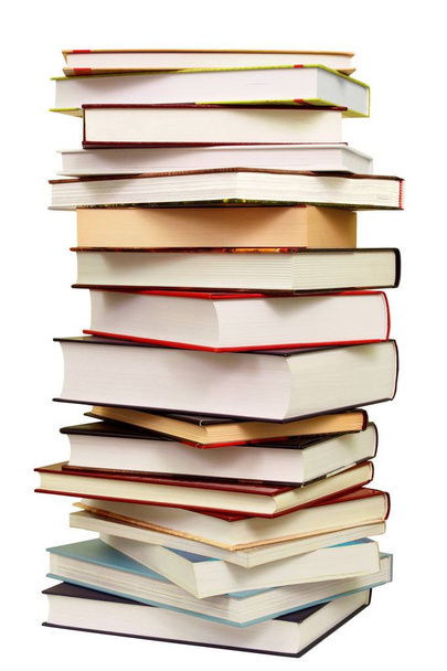 υψηλή στοίβα από βιβλία που απομονώνονται σε λευκό φόντο - Φωτογραφία, εικόνα