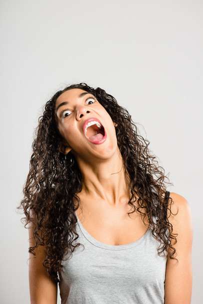 funny woman portrait real high definition grey background - Foto, afbeelding