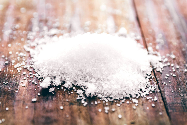 Sugar on wooden table - Photo, Image