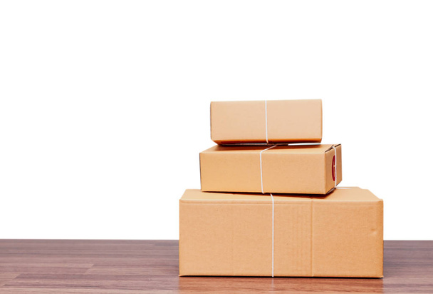 Stack of cardboard boxes isolated on white background - Photo, Image