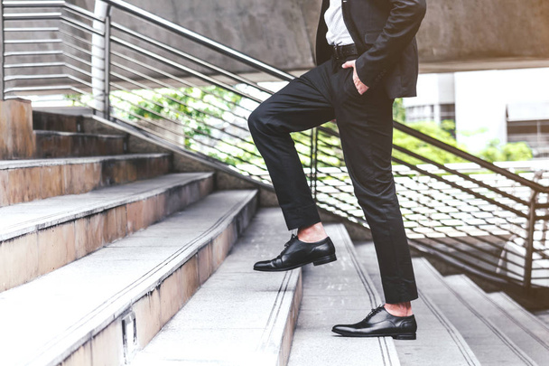 Businessman walking up the stairs - Fotografie, Obrázek