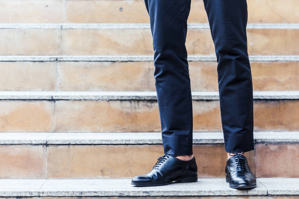 Businessman walking on the stairs - Foto, Imagem