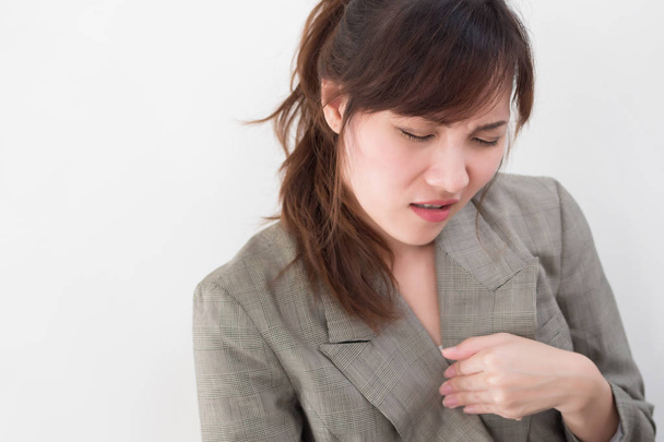woman with reflux sickness; portrait of sick stressed woman with acid reflux, gerd, indigestion symptoms; asian young adult woman health care model - Foto, Imagen