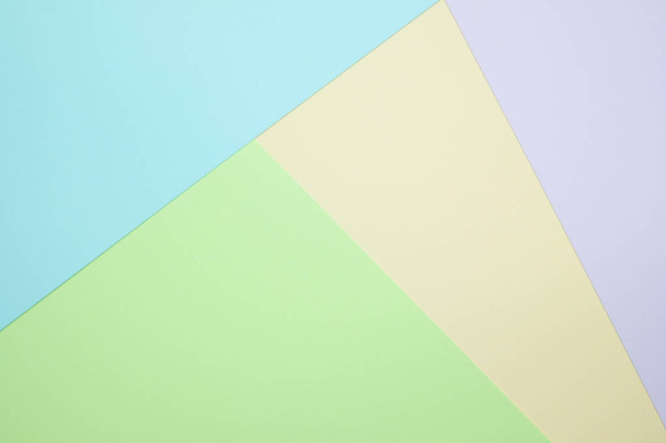 Fashionable  pastel colored paper flat lay top view, geometric background texture, pink, purple, yellow, beige, green and blue colour. - Valokuva, kuva