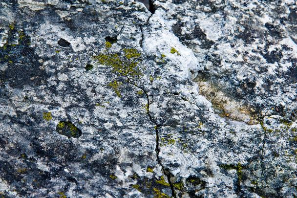 Texture, background, pattern. Old granite stones. An old stone wall. Texture of a stone wall. Brick wall from an old gray stone and sandstone texture background. - Foto, imagen