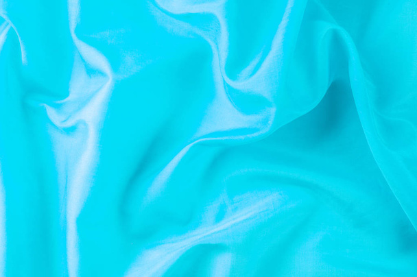 Texture sfondo di tessuto. Tessuto blu seta, acqua, blu, blu Bondi, blu cielo, blu blu, blu uovo rosa, Skobelov, turchese, nomi di fiori. Liscio elegante seta blu o raso può essere utilizzato come sfondo
 - Foto, immagini