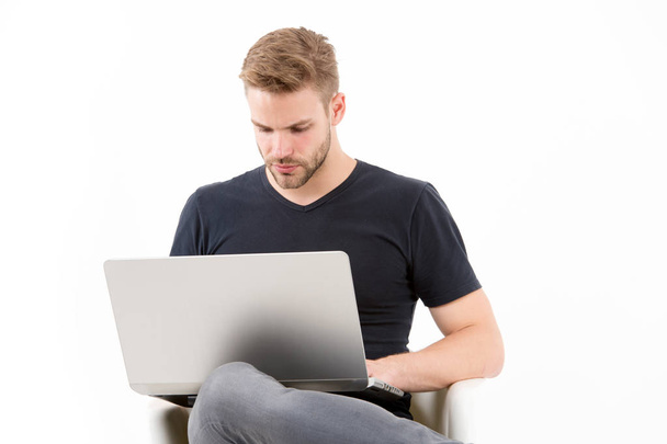 Having so much work to do. Man with laptop busy concentrated face planning. Guy handsome unshaven in black shirt works computer isolated white. Man busy with work laptop planning to do list. - Foto, Bild
