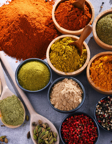 Variety of spices on kitchen table. - Photo, Image