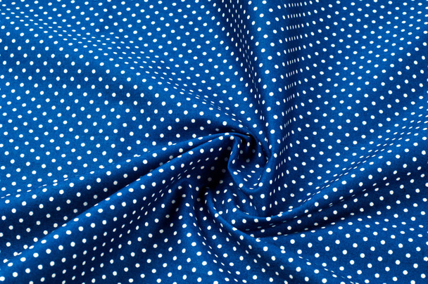 Textura patrón de fondo. Fondo abstracto de un lujoso tejido azul en lunares blancos pliegues ondulados de una textura de seda grunge de un material de terciopelo satinado o un fondo de pantalla lujoso o elegante
 - Foto, imagen