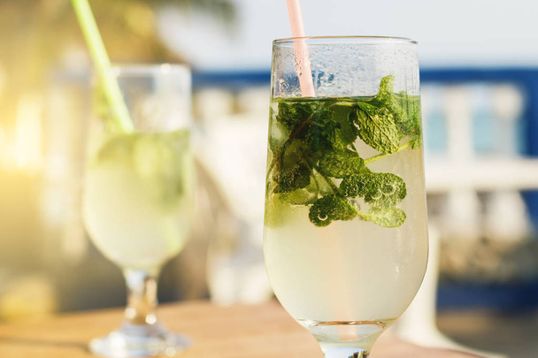 Two glasses of Mojito cocktail in the beach bar - Φωτογραφία, εικόνα