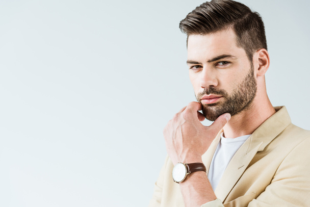 Fashionable confident man with hand near face isolated on white background - Φωτογραφία, εικόνα