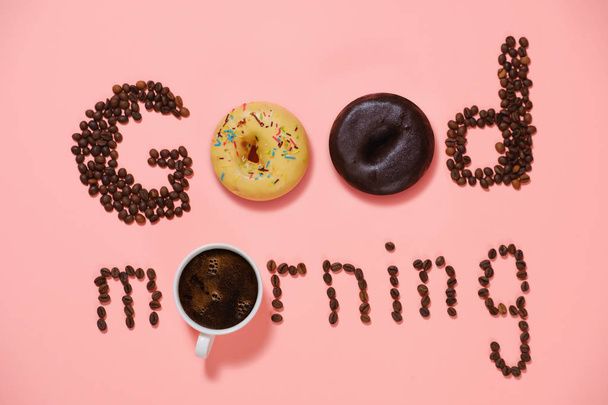 A cup of good morning coffee with donuts and grains on a pink background top view - Photo, Image