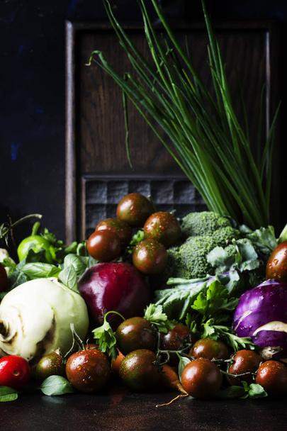 Summer mixed vegetables, healthy eating concept, still life on a dark background, selective focus - Photo, Image