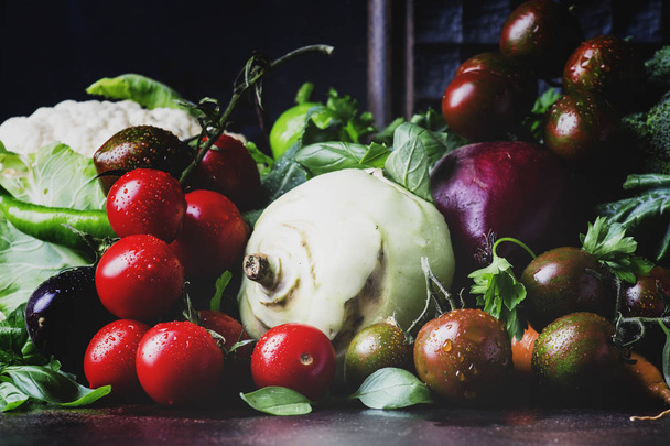 Summer mixed vegetables, healthy eating concept, still life on a dark background, selective focus - Zdjęcie, obraz