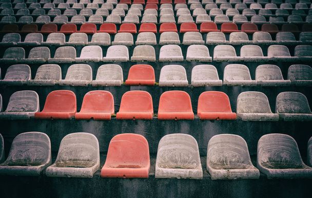 Vintage Stadium Chairs old time not used with dust red and white colors - Фото, изображение